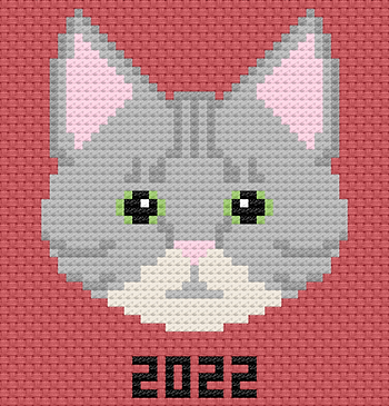 Stitched viewed of a cat-faced cross-stitched pattern