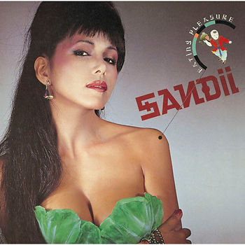 Cover of Sandii's album "Eating Pleasure", featuring Sandii herself wearing a low cut top with leafy bra cups